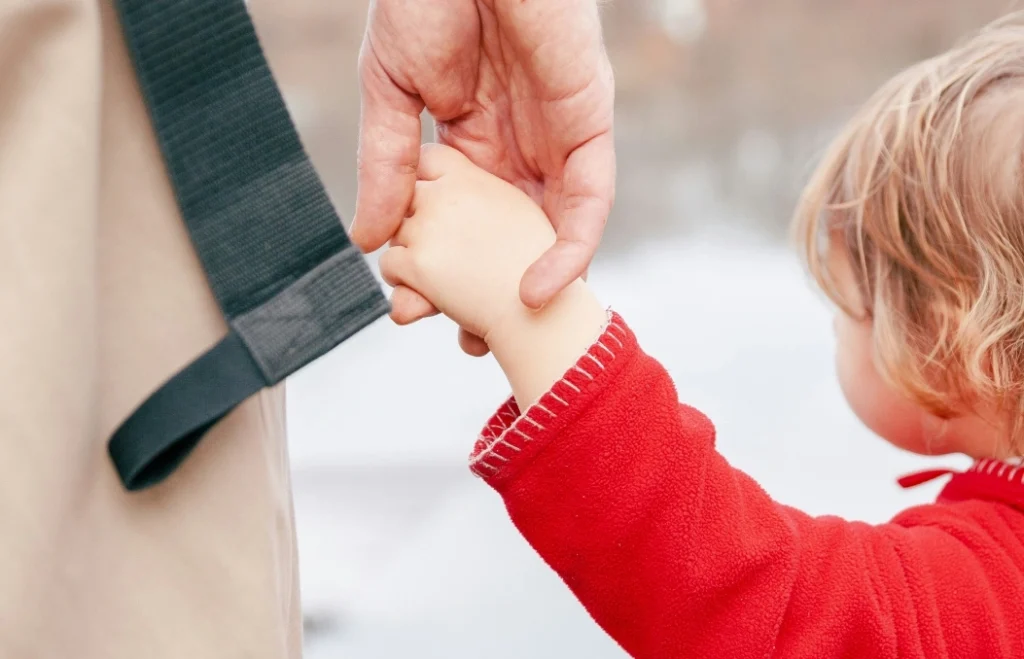 Child Holding Parent's Hand